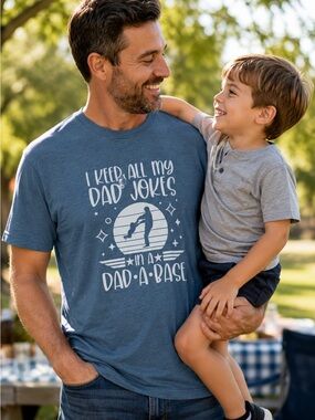 RUSTIC UNITED Graphic T-Shirt I KEEP ALL MY DAD JOKES Dad-A-Base Unisex Medium